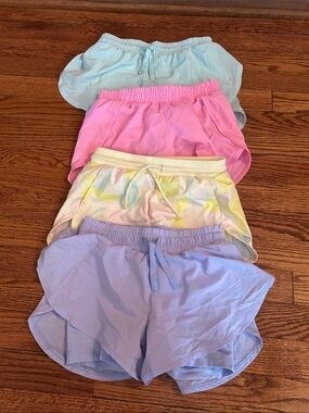 Girl target shorts 4 pack colors: purple, pink, yellow and mint green ALL SZ 6/7